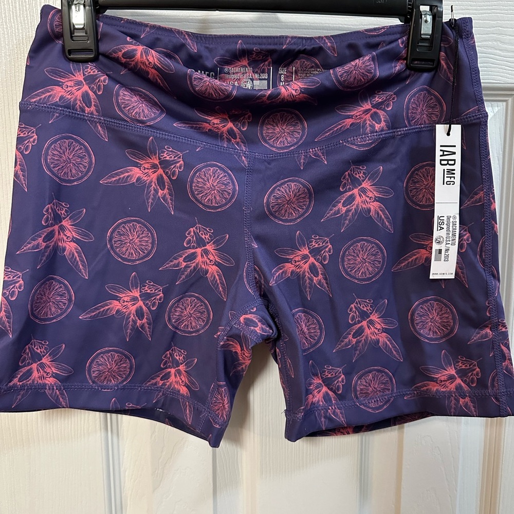 I Am Becoming No Ride Shorts with Purple/Pink Floral Pattern